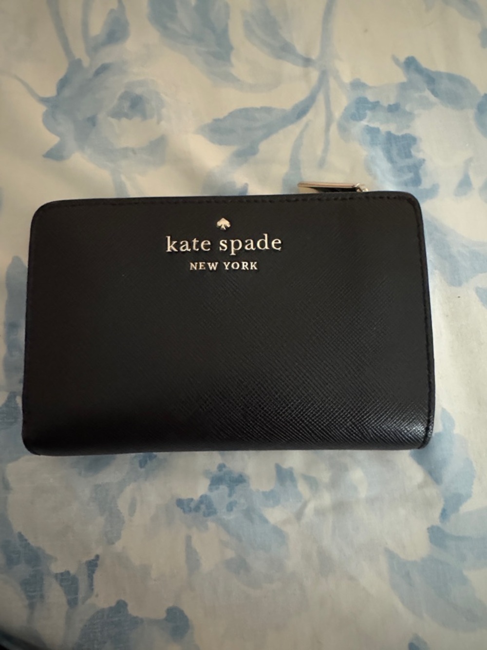 kate spade black leather zip-around wallet with gold logo